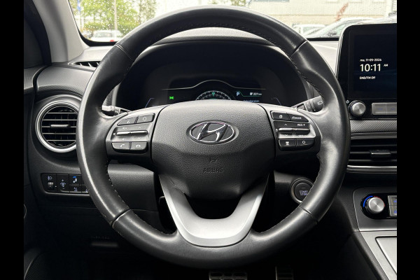 Hyundai Kona EV Fashion 64 kWh | 94,7% SOH | Trekhaak | Warmtepomp | Head-Up | 3Fase | Krell | Dodehoeksensoren | Camera |