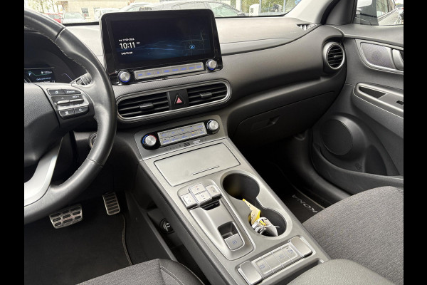 Hyundai Kona EV Fashion 64 kWh | 94,7% SOH | Trekhaak | Warmtepomp | Head-Up | 3Fase | Krell | Dodehoeksensoren | Camera |