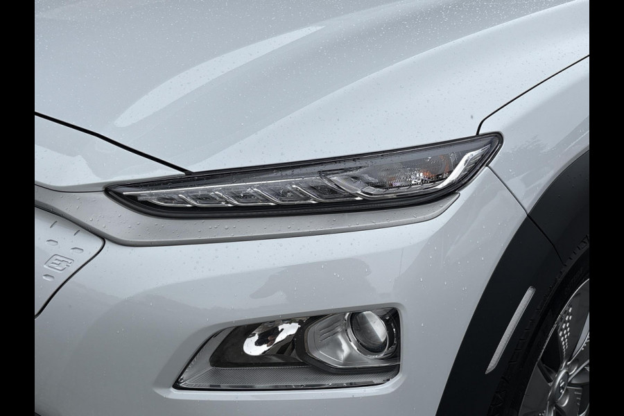 Hyundai Kona EV Fashion 64 kWh | 94,7% SOH | Trekhaak | Warmtepomp | Head-Up | 3Fase | Krell | Dodehoeksensoren | Camera |
