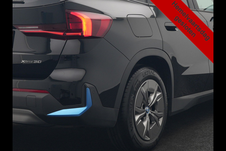 BMW iX1 xDrive30 64 kWh 306pk Dealer O.H. | Adaptief M Onderstel | Camera | Cruise Control | Stoelverwarming | Widescreen Navi | Park Assist | Apple Carplay | Navigatie | DAB | Standkachel |