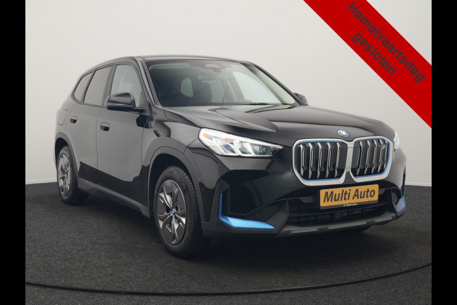BMW iX1 xDrive30 64 kWh 306pk Dealer O.H. | Adaptief M Onderstel | Camera | Cruise Control | Stoelverwarming | Widescreen Navi | Park Assist | Apple Carplay | Navigatie | DAB | Standkachel |