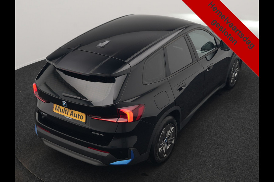BMW iX1 xDrive30 64 kWh 306pk Dealer O.H. | Adaptief M Onderstel | Camera | Cruise Control | Stoelverwarming | Widescreen Navi | Park Assist | Apple Carplay | Navigatie | DAB | Standkachel |