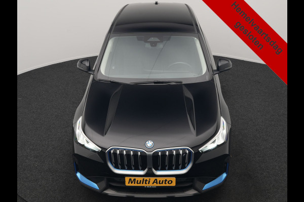 BMW iX1 xDrive30 64 kWh 306pk Dealer O.H. | Adaptief M Onderstel | Camera | Cruise Control | Stoelverwarming | Widescreen Navi | Park Assist | Apple Carplay | Navigatie | DAB | Standkachel |