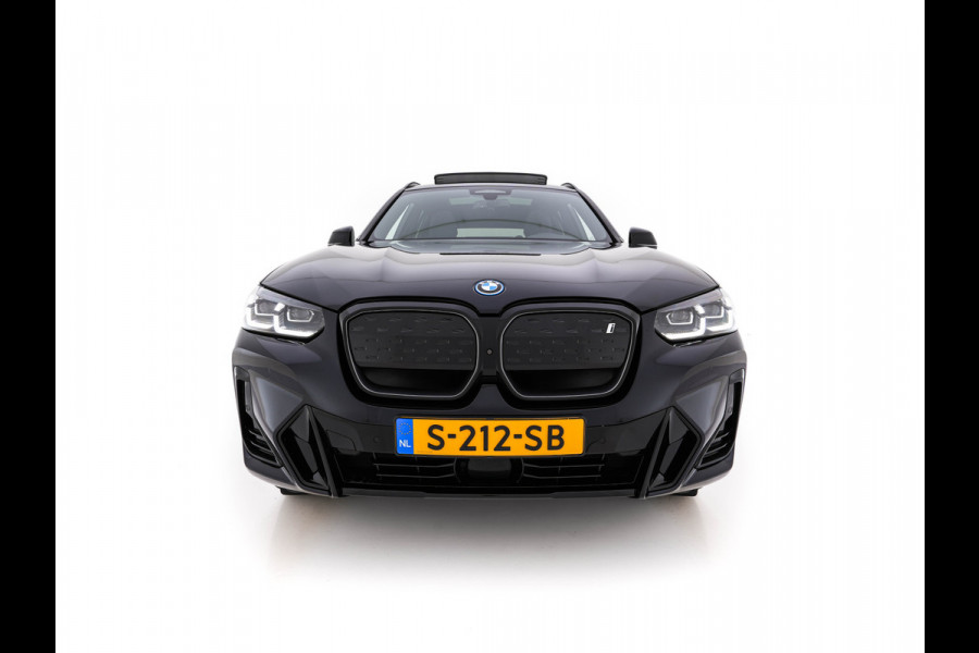 BMW iX3 High Executive 80 kWh Facelift [ 3-Fase-11kW) ] {SOH-100%} (INCL-BTW) Aut. *PANO | LEATHER | ADAPTIVE-CRUISE | FULL-LED | HARMAN/KARDON | TOPVIEW | MEMORY-PACK | BLINDSPOT | DIGI-COCKPIT | HEATED-COMFORTSEATS | DAB+ | NAVI-FULLMAP | HEAD-UP | 20''ALU