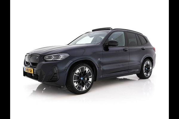 BMW iX3 High Executive 80 kWh Facelift [ 3-Fase-11kW) ] {SOH-100%} (INCL-BTW) Aut. *PANO | LEATHER | ADAPTIVE-CRUISE | FULL-LED | HARMAN/KARDON | TOPVIEW | MEMORY-PACK | BLINDSPOT | DIGI-COCKPIT | HEATED-COMFORTSEATS | DAB+ | NAVI-FULLMAP | HEAD-UP | 20''ALU