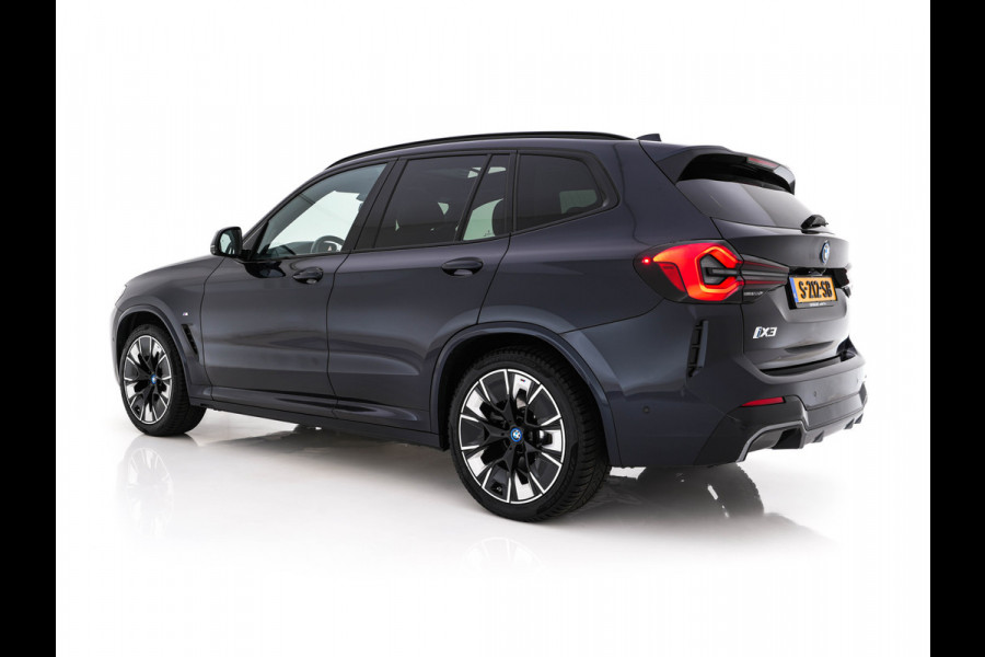 BMW iX3 High Executive 80 kWh Facelift [ 3-Fase-11kW) ] {SOH-100%} (INCL-BTW) Aut. *PANO | LEATHER | ADAPTIVE-CRUISE | FULL-LED | HARMAN/KARDON | TOPVIEW | MEMORY-PACK | BLINDSPOT | DIGI-COCKPIT | HEATED-COMFORTSEATS | DAB+ | NAVI-FULLMAP | HEAD-UP | 20''ALU