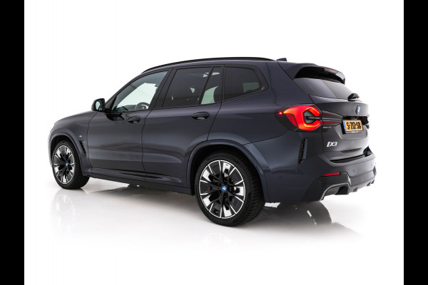 BMW iX3 High Executive 80 kWh Facelift [ 3-Fase-11kW) ] {SOH-100%} (INCL-BTW) Aut. *PANO | LEATHER | ADAPTIVE-CRUISE | FULL-LED | HARMAN/KARDON | TOPVIEW | MEMORY-PACK | BLINDSPOT | DIGI-COCKPIT | HEATED-COMFORTSEATS | DAB+ | NAVI-FULLMAP | HEAD-UP | 20''ALU