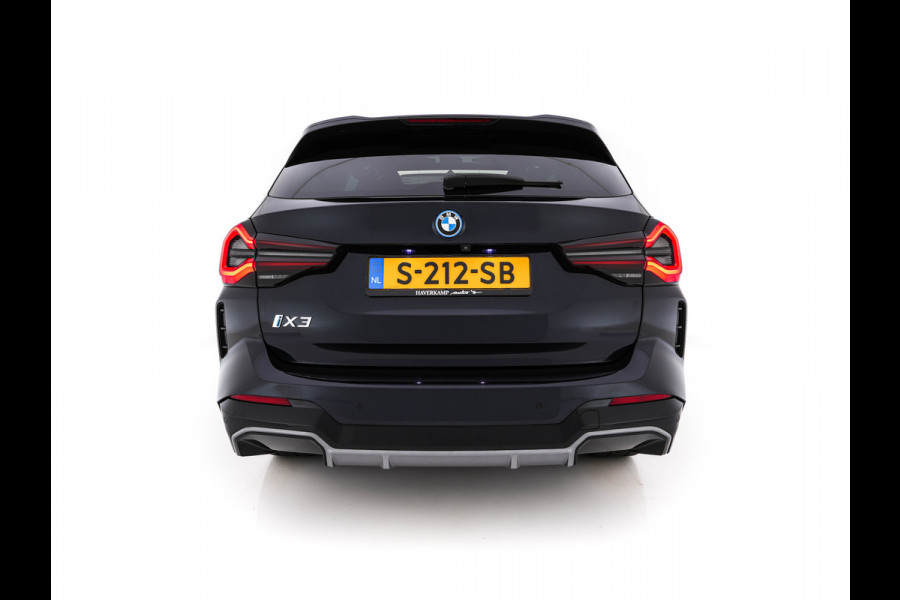 BMW iX3 High Executive 80 kWh Facelift [ 3-Fase-11kW) ] {SOH-100%} (INCL-BTW) Aut. *PANO | LEATHER | ADAPTIVE-CRUISE | FULL-LED | HARMAN/KARDON | TOPVIEW | MEMORY-PACK | BLINDSPOT | DIGI-COCKPIT | HEATED-COMFORTSEATS | DAB+ | NAVI-FULLMAP | HEAD-UP | 20''ALU