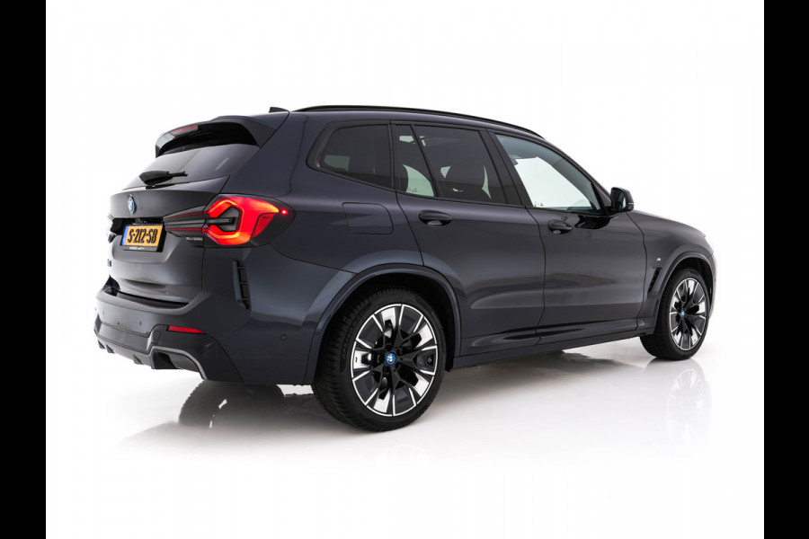 BMW iX3 High Executive 80 kWh Facelift [ 3-Fase-11kW) ] {SOH-100%} (INCL-BTW) Aut. *PANO | LEATHER | ADAPTIVE-CRUISE | FULL-LED | HARMAN/KARDON | TOPVIEW | MEMORY-PACK | BLINDSPOT | DIGI-COCKPIT | HEATED-COMFORTSEATS | DAB+ | NAVI-FULLMAP | HEAD-UP | 20''ALU