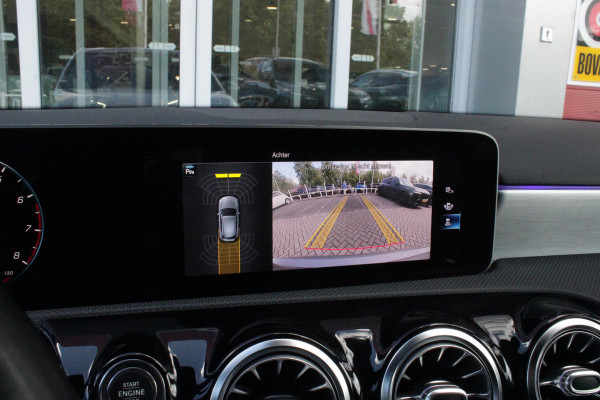 Mercedes-Benz A-Klasse 220 190PK AUTOMAAT BUSINESS SOLUTION AMG | PANORAMA SCHUIF/KANTEL DAK | SFEER VERLICHTING VOOR + ACHTER | STOEL VERWARMING OP BEIDE VOORSTOELEN | MULTIBEAM LED KOPLAMPEN | ACHTERUITRIJ CAMERA | APPLE CARPLAY/ANDROID AUTO | NAVIGATIE | CRUISE CONTROL | NIGHT PAKKET | VERKEERSLICHTEN WEERGAVE | 17" LICHTMETALEN VELGEN AMG | HEMELBEKLEDING ZWART | MBUX MULTIMEDIA SYSTEEM | SPORTSTOELEN | PARKEERSENSOREN VOOR + ACHTER | DRAADLOZE TELEFOONLADER |