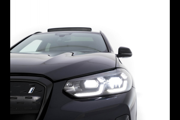 BMW iX3 High Executive 80 kWh Facelift [ 3-Fase-11kW) ] {SOH-100%} (INCL-BTW) Aut. *PANO | LEATHER | ADAPTIVE-CRUISE | FULL-LED | HARMAN/KARDON | TOPVIEW | MEMORY-PACK | BLINDSPOT | DIGI-COCKPIT | HEATED-COMFORTSEATS | DAB+ | NAVI-FULLMAP | HEAD-UP | 20''ALU
