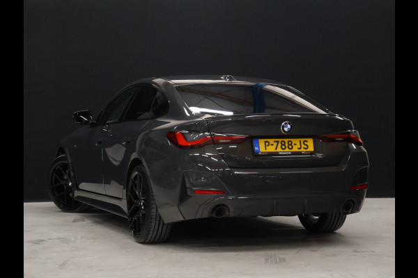 BMW 4 Serie Gran Coupé 420i Business Edition Plus M Sport [SCHUIFKANTELDAK, MEMORY SEATS, STUURVERWARMING, STOELVERWARMING, DRAADLOZE LADER, CAMERA, ADAPTIVE CRUISE, PDC 360, CLIMATE, NIEUWSTAAT]