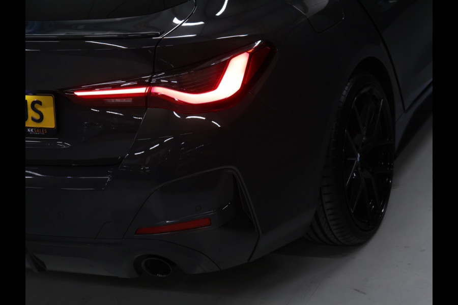 BMW 4 Serie Gran Coupé 420i Business Edition Plus M Sport [SCHUIFKANTELDAK, MEMORY SEATS, STUURVERWARMING, STOELVERWARMING, DRAADLOZE LADER, CAMERA, ADAPTIVE CRUISE, PDC 360, CLIMATE, NIEUWSTAAT]