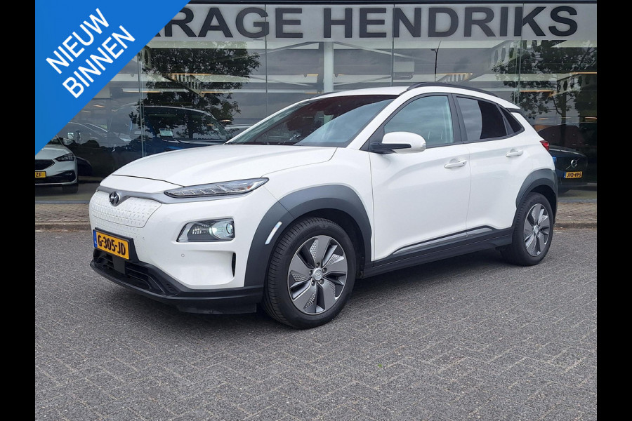 Hyundai Kona EV Premium 64 kWh | SOH: nnb | Warmtepomp | Lage km-stand | Leder | HUD | Blindspot | Full LED |