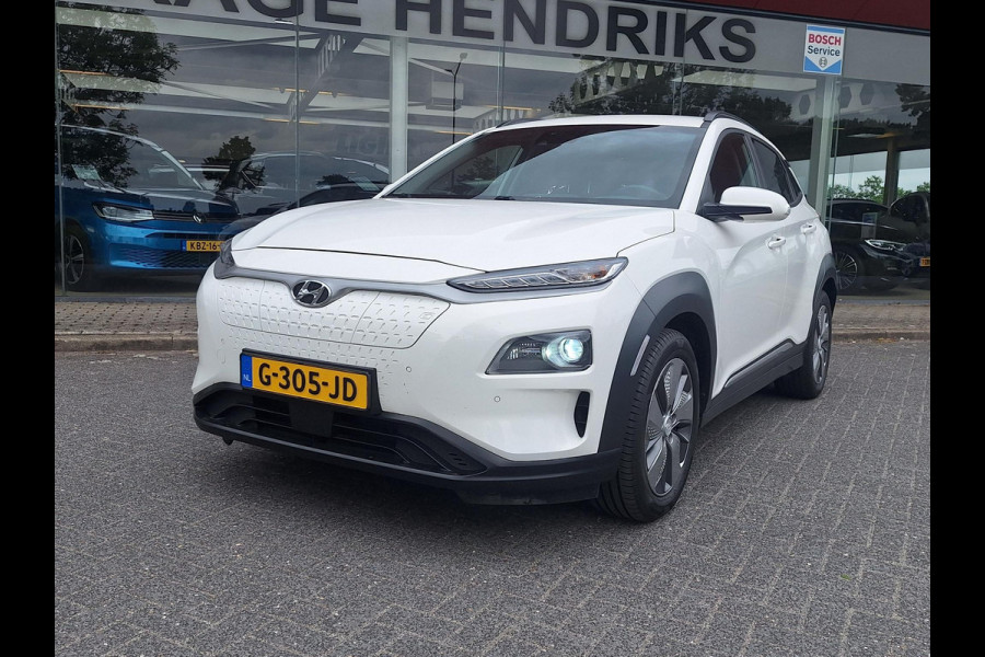 Hyundai Kona EV Premium 64 kWh | SOH: nnb | Warmtepomp | Lage km-stand | Leder | HUD | Blindspot | Full LED |
