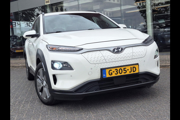 Hyundai Kona EV Premium 64 kWh | SOH: nnb | Warmtepomp | Lage km-stand | Leder | HUD | Blindspot | Full LED |