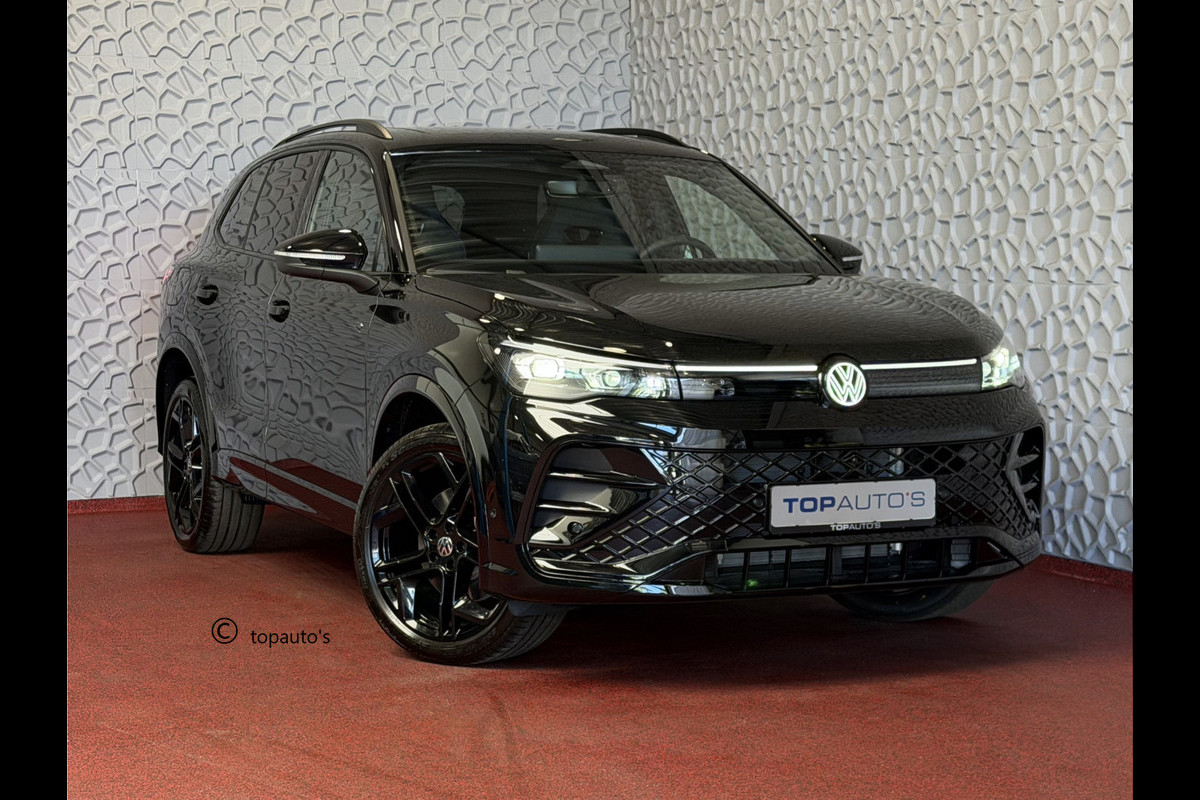 Volkswagen Tiguan 1.5 eHYBRID 272 PK NW AUTO R-LINE VW.TREKHAAK BLACK PANO XL.NAVI STOEL/STUUR VERW. BLACK.STYLE 360.CAM ELEK.KLEP MATRIX.LED 20'' PHEV PLUG IN HYBRID ✅Top Auto's Wijchen , 30 Jaar Specialist in Volkswagen  : Alle Type's : R-Line Edition / Style / First Edition / Highline / Life , Zowel PHEV / HEV / MHEV / Benzine ✅