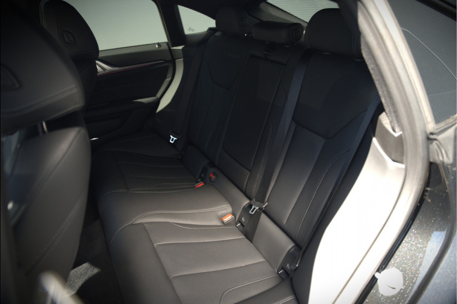 BMW i4 eDrive40 84 kWh | Stoelverwarming | Stuurverwarming | Apple Carplay | Adaptive Cruise Control | Memory Seat | Trekhaak | Camera | Parkeersensoren | Navigatie | Ambiance Verlichting | HIFI | SOH 96.52% |