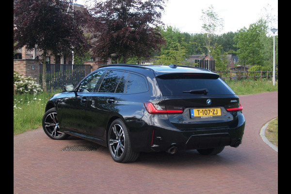 BMW 3 Serie Touring 320e M-Pakket | Panoramadak | Sfeerverlichting | Facelift |