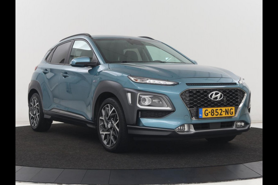 Hyundai Kona 1.6 GDI HEV Premium | 1e eigenaar | Stoelventilatie | Leder | Adaptive cruise | Head-Up | Trekhaak | Achterbankverwarming | Carplay | Navigatie | Keyless | Krell Audio | Side Assist | Stoelverwarming