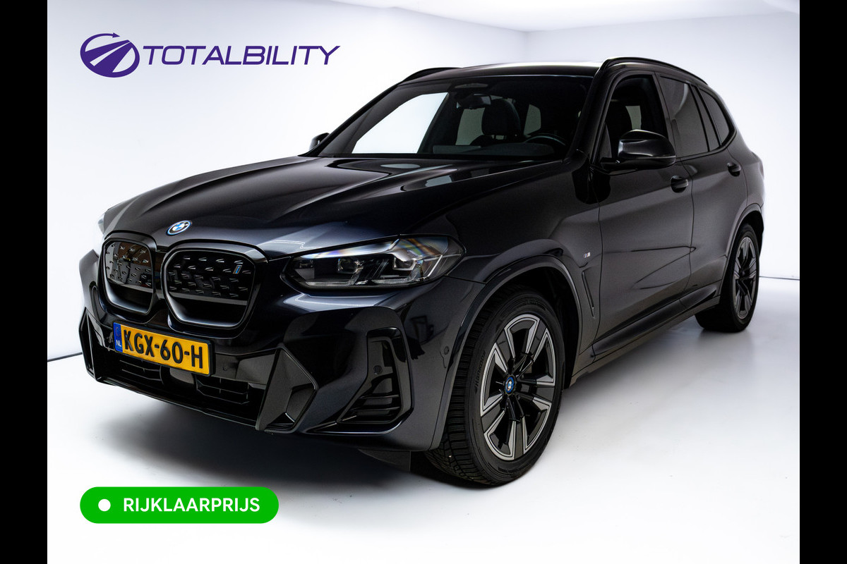 BMW iX3 M-Sport High Executive 80 kWh | Pano | Leder | Led | Shadowline | Stoelverwarming | Camera | Carbon black metallic