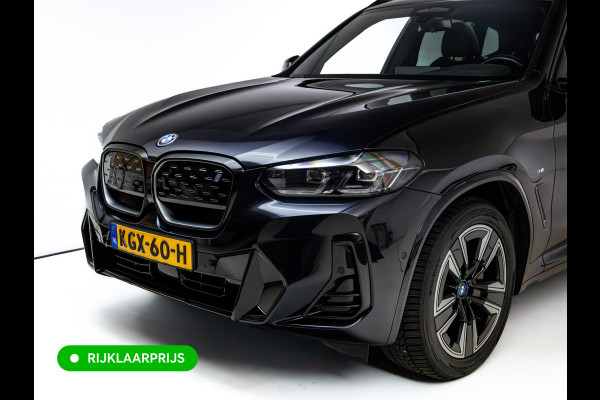 BMW iX3 M-Sport High Executive 80 kWh | Pano | Leder | Led | Shadowline | Stoelverwarming | Camera | Carbon black metallic