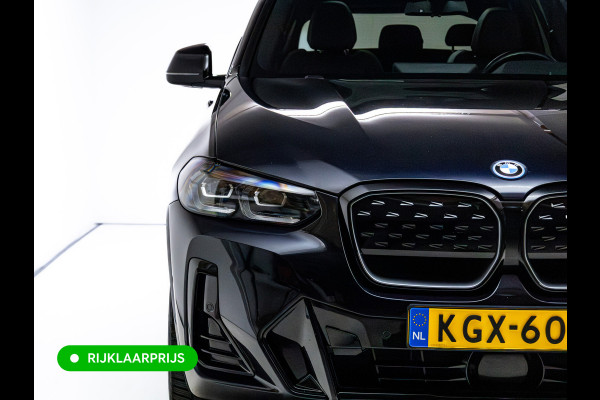 BMW iX3 M-Sport High Executive 80 kWh | Pano | Leder | Led | Shadowline | Stoelverwarming | Camera | Carbon black metallic