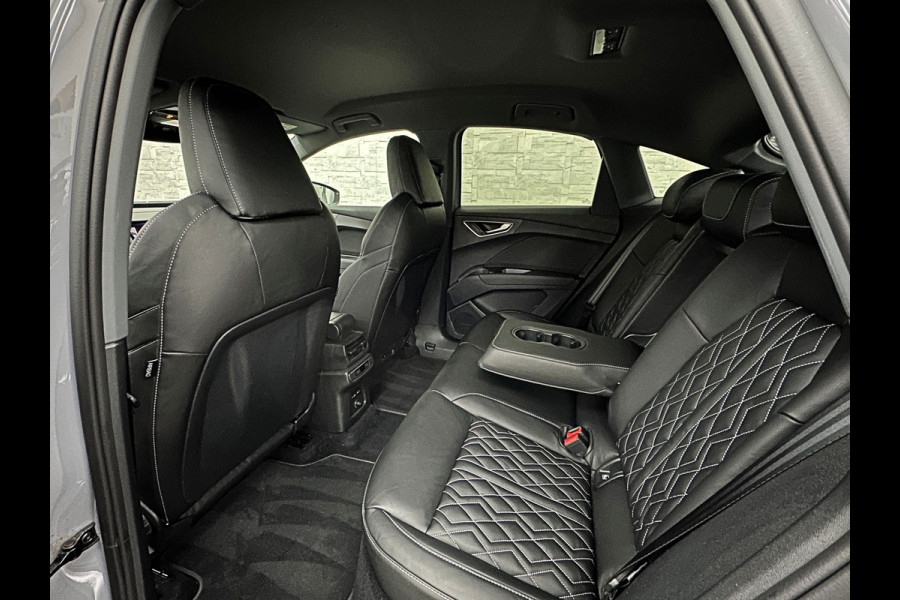 Audi Q4 Sportback e-tron 40 77 kWh RS-Leder | Uniek Interieur! | ACC | 96% SOH | Sportstoelen | Stuurverwarming | 3-Zone Clima | Carplay | Getint Glas | Camera | Standkachel | LED | Dodehoek | Virtual-Cockpit | Navi |