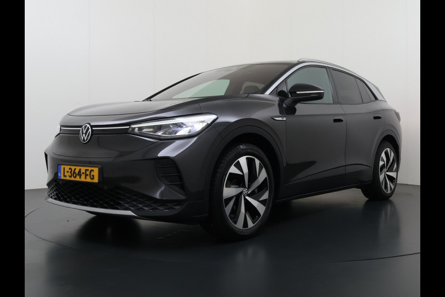 Volkswagen ID.4 First 82kWh SOH 93% Warmtepomp Trekhaak Camera Adap.Cruise Apple Carplay Android Auto Stuur+Stoelverwarming Navi Ecc Pdc Lmv 20" Led Wifi Voorruitverwarming DAB Isofix Verkeersbord detectie 1.000KG Trekgewicht 1e Eigenaar Dealeronderhouden