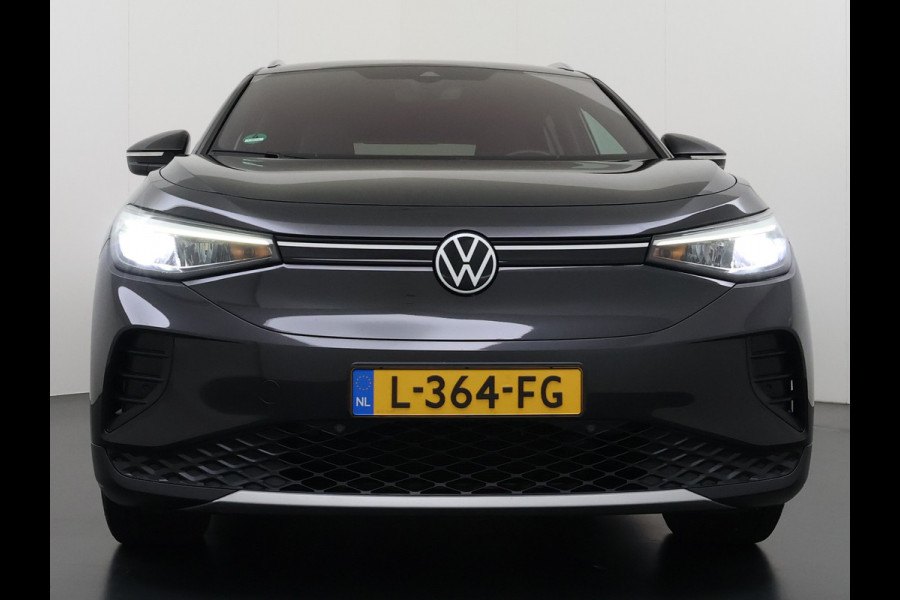 Volkswagen ID.4 First 82kWh SOH 93% Warmtepomp Trekhaak Camera Adap.Cruise Apple Carplay Android Auto Stuur+Stoelverwarming Navi Ecc Pdc Lmv 20" Led Wifi Voorruitverwarming DAB Isofix Verkeersbord detectie 1.000KG Trekgewicht 1e Eigenaar Dealeronderhouden