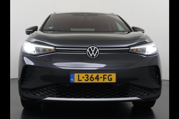 Volkswagen ID.4 First 82kWh SOH 93% Warmtepomp Trekhaak Camera Adap.Cruise Apple Carplay Android Auto Stuur+Stoelverwarming Navi Ecc Pdc Lmv 20" Led Wifi Voorruitverwarming DAB Isofix Verkeersbord detectie 1.000KG Trekgewicht 1e Eigenaar Dealeronderhouden