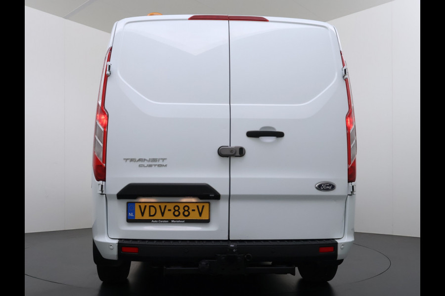 Ford Transit Custom 300 2.0TDCI 130PK Dubbele Cabine L2H1 Trekhaak Navi Camera Airco Cruise Control Pdc Trend DC Schuifdeur Betonplex Vloer Wandbetimmering Bott Inbouwkast Lane Assist 2.800KG Trekgewicht 1e Eigenaar