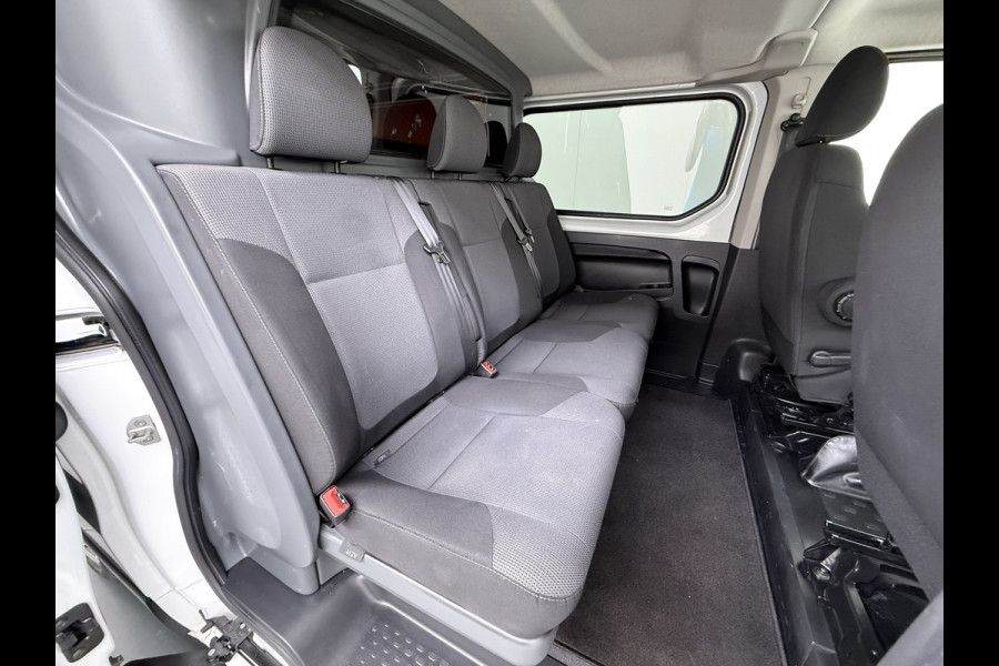 Renault Trafic 2.0 dCi 120 T29 L2H1 Dubbele Cabine Trekhaak Camera Navi Ecc Cruise Control Pdc DAB Business Euro 6 Betonplex Vloer Wandbetimmering Regen-Lichtsensor 2.000kg Trekgewicht 1e Eigenaar 5-Persoons