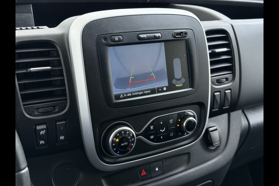 Renault Trafic 2.0 dCi 120 T29 L2H1 Dubbele Cabine Trekhaak Camera Navi Ecc Cruise Control Pdc DAB Business Euro 6 Betonplex Vloer Wandbetimmering Regen-Lichtsensor 2.000kg Trekgewicht 1e Eigenaar 5-Persoons