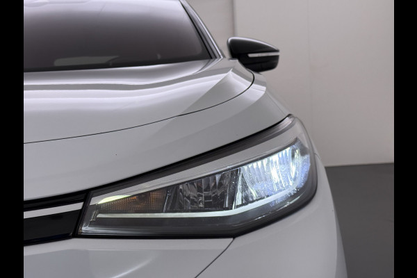 Volkswagen ID.4 First 82kWh SOH 90% Warmtepomp Trekhaak Camera Adap.Cruise Apple Carplay Android Auto Stuur+Stoelverwarming Navi Ecc Pdc Lmv 20" Led Wifi Voorruitverwarming DAB Isofix Verkeersbord detectie 1.000KG Trekgewicht 1e Eigenaar Dealeronderhouden