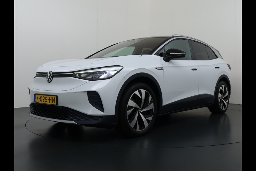 Volkswagen ID.4 First 82kWh SOH 90% Warmtepomp Trekhaak Camera Adap.Cruise Apple Carplay Android Auto Stuur+Stoelverwarming Navi Ecc Pdc Lmv 20" Led Wifi Voorruitverwarming DAB Isofix Verkeersbord detectie 1.000KG Trekgewicht 1e Eigenaar Dealeronderhouden