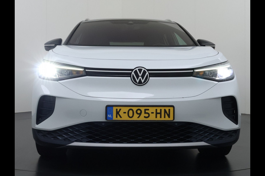 Volkswagen ID.4 First 82kWh SOH 90% Warmtepomp Trekhaak Camera Adap.Cruise Apple Carplay Android Auto Stuur+Stoelverwarming Navi Ecc Pdc Lmv 20" Led Wifi Voorruitverwarming DAB Isofix Verkeersbord detectie 1.000KG Trekgewicht 1e Eigenaar Dealeronderhouden