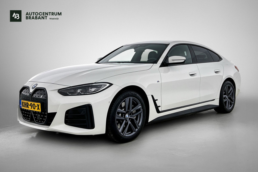 BMW i4 EDrive35 70 kWh M-sportpakket (1e Eig, Dealer OnderH, Navi Pro, Camera, Carplay, Addapt Cruise, StoelV, PDC V+A, Etc)