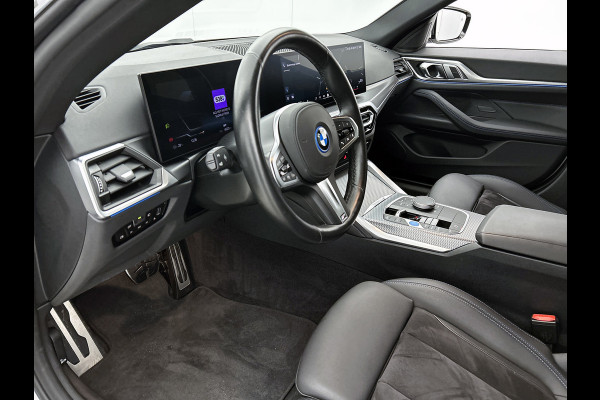BMW i4 EDrive35 70 kWh M-sportpakket (1e Eig, Dealer OnderH, Navi Pro, Camera, Carplay, Addapt Cruise, StoelV, PDC V+A, Etc)