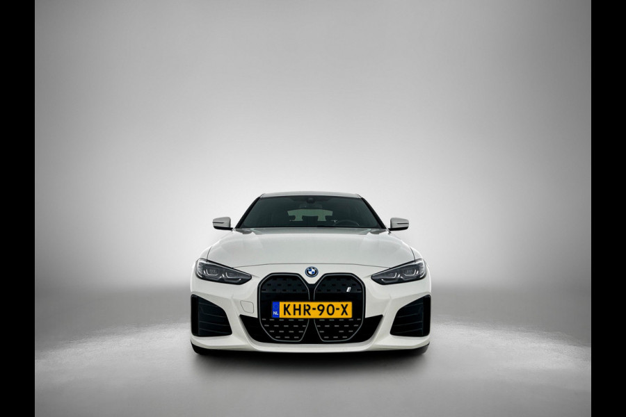 BMW i4 EDrive35 70 kWh M-sportpakket (1e Eig, Dealer OnderH, Navi Pro, Camera, Carplay, Addapt Cruise, StoelV, PDC V+A, Etc)