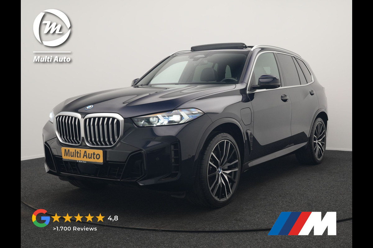 BMW X5 xDrive50e M Sport PHEV 490pk Dealer O.H. | Panodak Sky Lounge | Luchtvering | Head Up | 360 Camera | Harman / Kardon | Nappa Lederen Comfortstoelen Memory & Verwarmd | Carbon Schwarz | Apple Carplay | Keyless | Blis | 22"L.M | Plug In Hybrid |