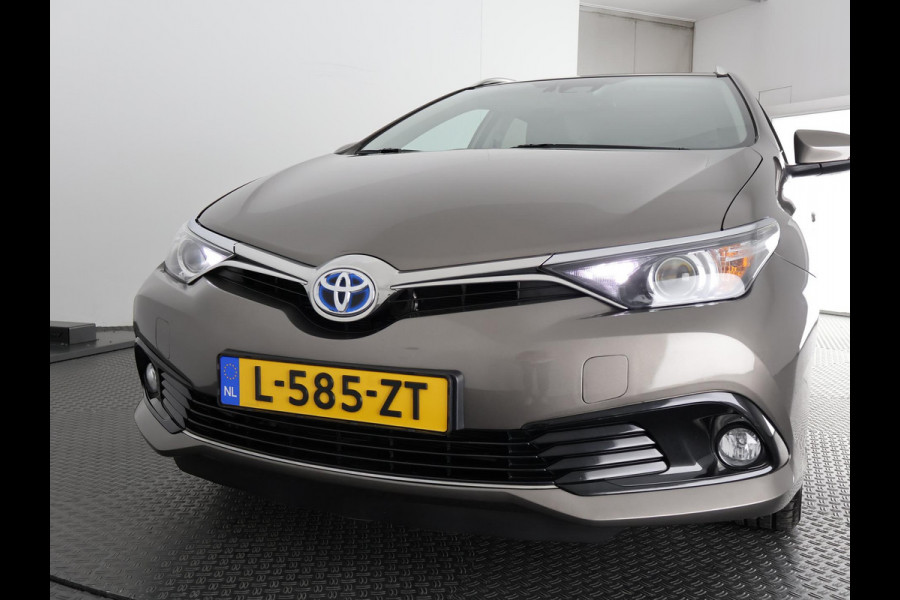 Toyota Auris Touring Sports 1.8 DYNAMIC NAVI DEALERAUTO GARANTIE 5-2028* CAMERA . TREKHAAK. KEYLESS START/STOP . CRUISE CONTROL
