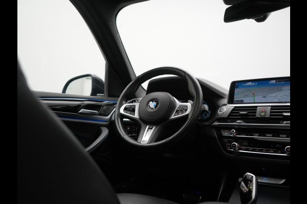 BMW X3 xDrive30e M Sport PHEV 293pk Dealer O.H. | Trekhaak Af Fabriek | Panodak | Head Up | 360 Camera | Adaptief Onderstel | Lederen Sportstoelen Memory & Verwarmd | Sfeerverlichting | Stuur Verwarmd | Keyless | Blis | Apple Carplay | Plug In Hybrid |