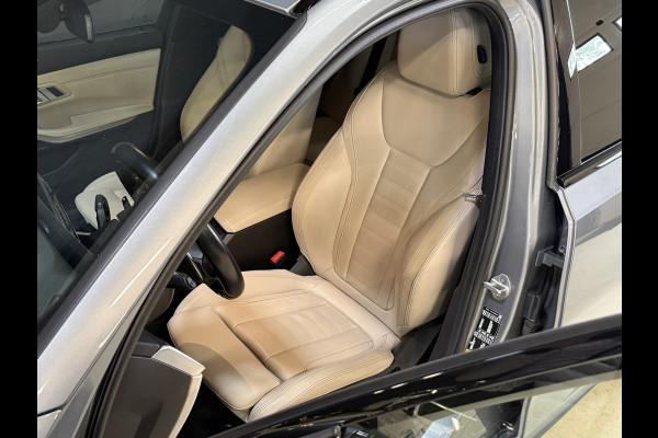 BMW 3 Serie Touring 330e | M-pakket | Lederen sportstoelen | Harman/Kardon | Sfeerverlichting | Full LED