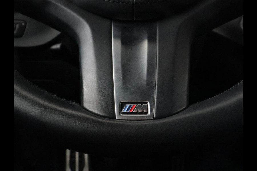 BMW 1-serie 118i M Sport | Carplay | Sportstoelen | Camera | Half leder | Navigatie | Live Cockpit | Park Assist | Full LED | Climate control | Sfeerverlichting | Cruise control | Bluetooth