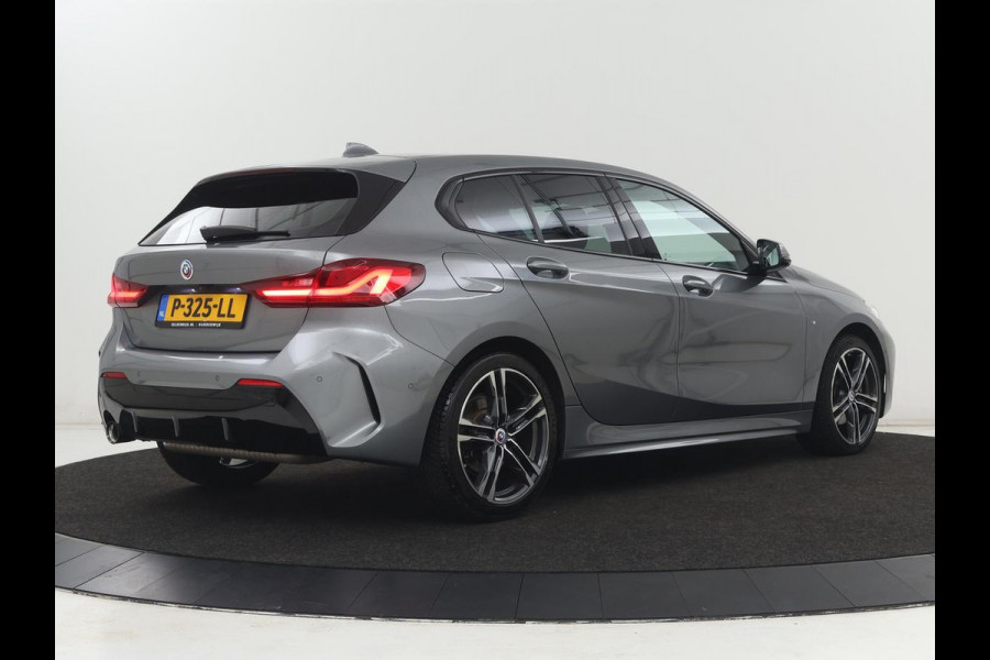 BMW 1-serie 118i M Sport | Carplay | Sportstoelen | Camera | Half leder | Navigatie | Live Cockpit | Park Assist | Full LED | Climate control | Sfeerverlichting | Cruise control | Bluetooth