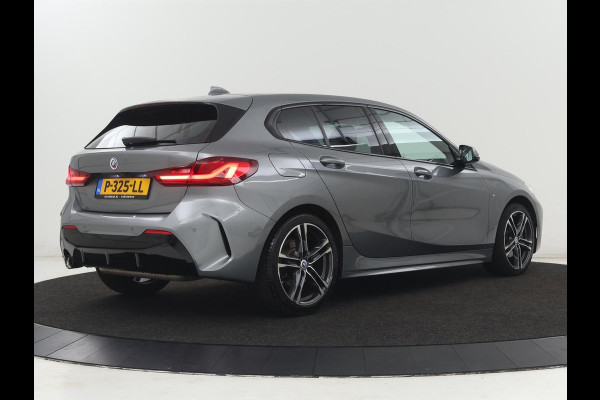 BMW 1-serie 118i M Sport | Carplay | Sportstoelen | Camera | Half leder | Navigatie | Live Cockpit | Park Assist | Full LED | Climate control | Sfeerverlichting | Cruise control | Bluetooth