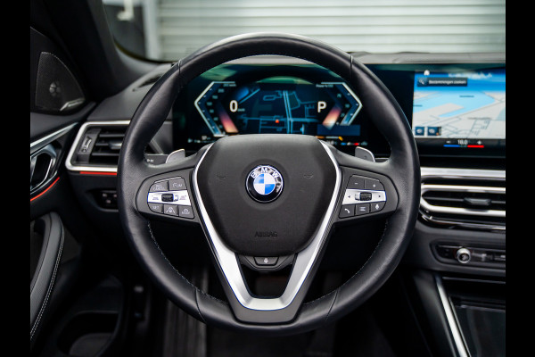 BMW 4 Serie Cabrio 420i High Executive | Sportleder | Camera | Harman | Laser | Head-up