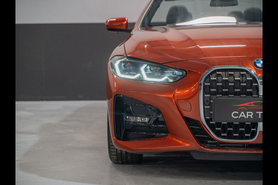 BMW 4 Serie Cabrio 420i High Executive | Sportleder | Camera | Harman | Laser | Head-up