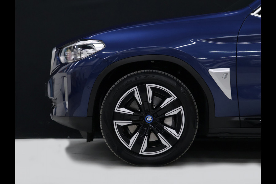BMW iX3 Executive 80 kWh [SCHUIFKANTELDAK, ADAPTIVE CRUISE, MEMORY, APPLE CARPLAY, ANDROID, CAMERA, PDC, STOELVERWARMING, TREKHAAK, DRAADLOZE OPLADER, NIEUWSTAAT]